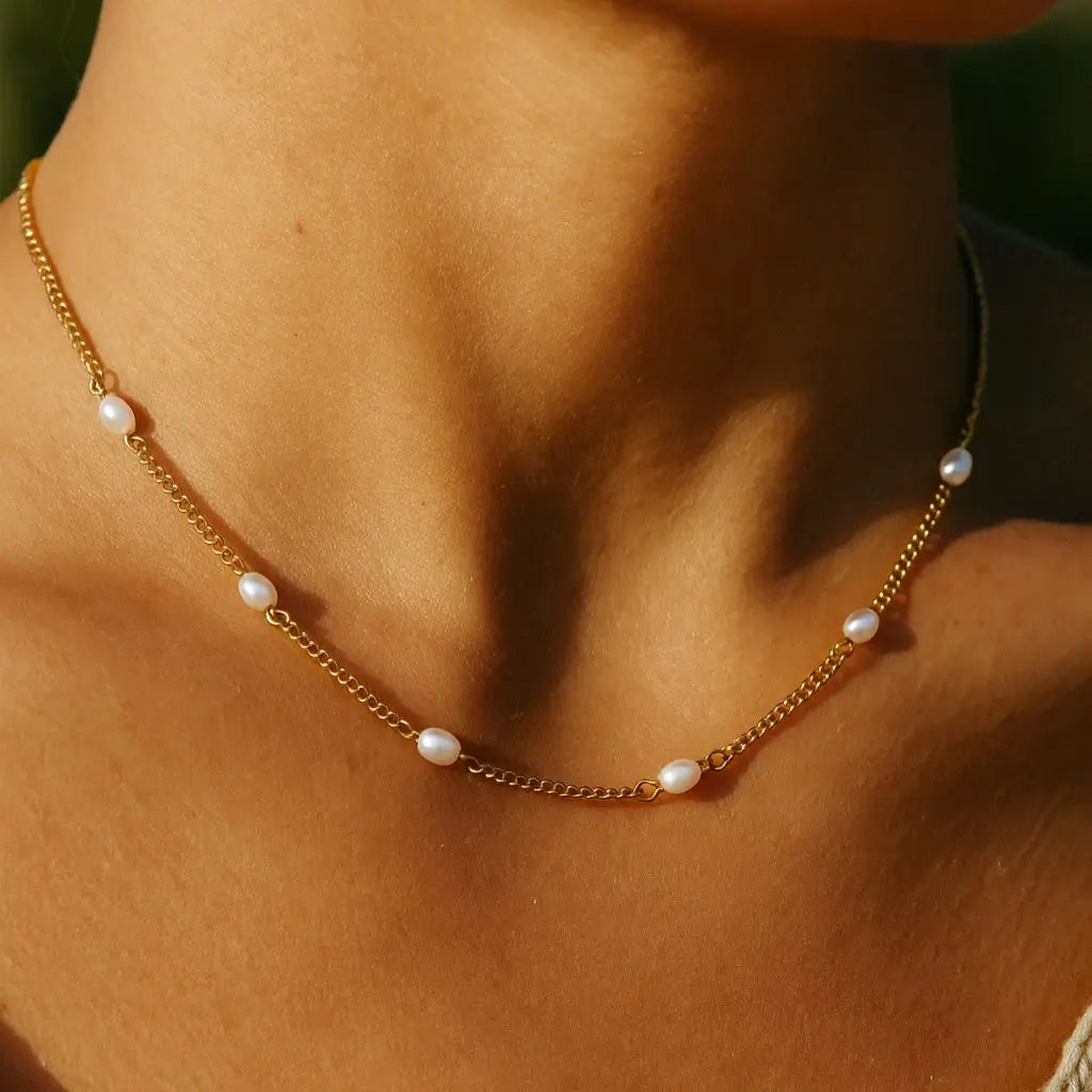 Eilyor minimal pearl choker 18k PVD on model at neck