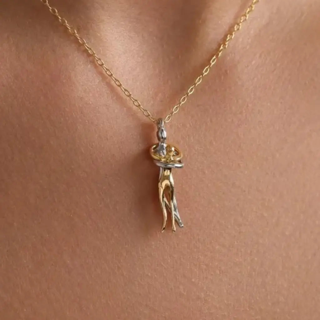 Eilyor Hug Necklace 18k PVD shown on model at collarbone